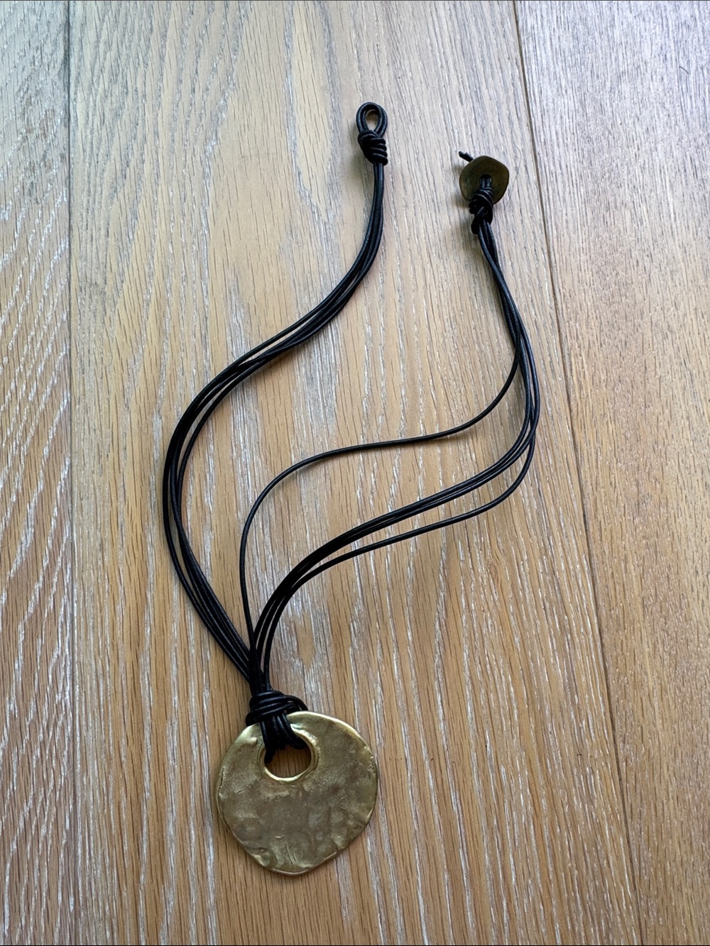 Handcrafted Gold Disc Pendant Necklace on leather Cord
